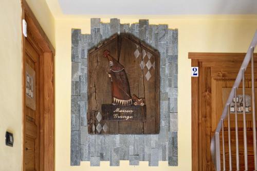 a wall mural of aieval at Maison Grange 4 in Pila