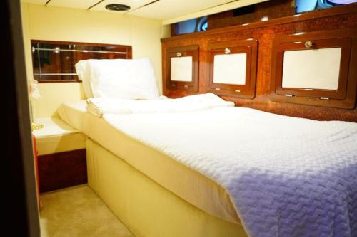 a bedroom with a bed on a boat at DIAMOND YACHT in Istanbul