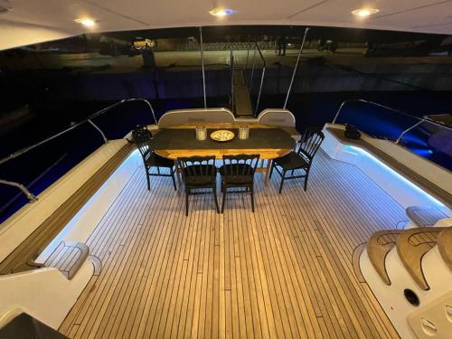 a table and chairs on the back of a boat at DIAMOND YACHT in Istanbul