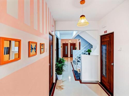 a hallway with a staircase in a house at OYO Home Designer Stay Hinjewadi in Hinjewadi