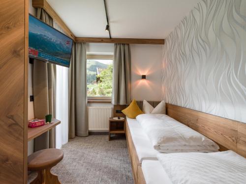 Postel nebo postele na pokoji v ubytování Apartments Schöne Aussicht