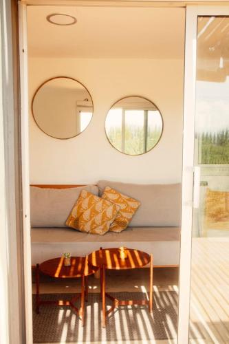 a living room with a couch and a table at Las Guaras Valle de Uco in Tunuyán