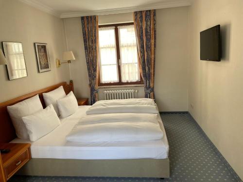 Posteľ alebo postele v izbe v ubytovaní Antonappartements