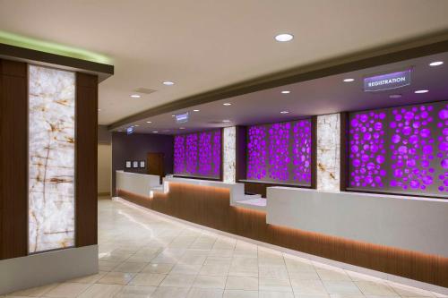 a lobby with purple lights on the wall at Hilton Vacation Club Polo Towers Las Vegas in Las Vegas