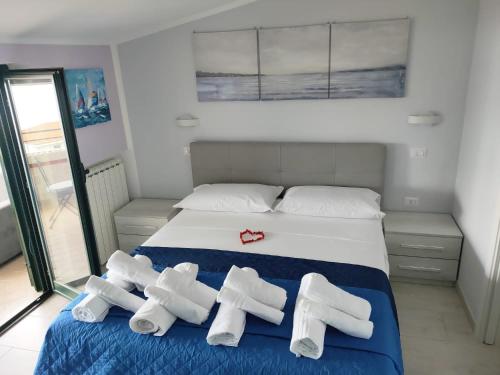 Postel nebo postele na pokoji v ubytování Sognando Agropoli