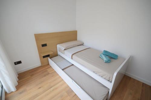 Katil atau katil-katil dalam bilik di Suites Port Cambrils