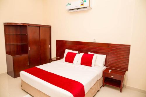Postel nebo postele na pokoji v ubytování Al Jabal Hotel