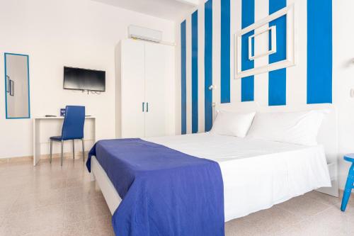 Cama o camas de una habitación en Dimora Terra di Puglia