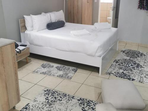 Ένα ή περισσότερα κρεβάτια σε δωμάτιο στο Comfort e Casa