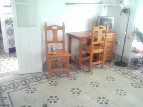 Køkken eller tekøkken på Charming House in Puente Mayorga + Sunny Terrace