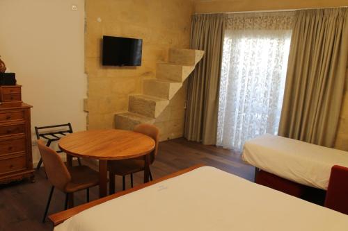 Postel nebo postele na pokoji v ubytování Palazzino Nina Boutique Hotel