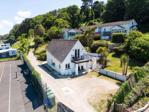 an aerial view of a white house at Baywatch Sands in Wadebridge