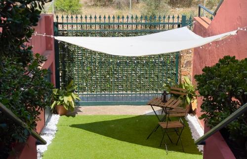 a garden with a tent and a swimming pool at Casa Vacanze Maride in Capitana