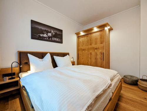 Postel nebo postele na pokoji v ubytování Das Wipferl - Dein Nest in den Bergen