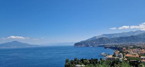 a view of the amalfi coast with mountains in the background at Appartamento Villa Bianca su "Corso ITALIA" in Sorrento