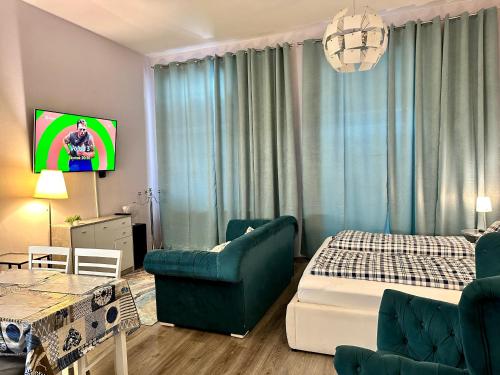 Ένα ή περισσότερα κρεβάτια σε δωμάτιο στο Kings main square Apartment