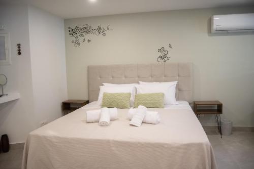 Ένα ή περισσότερα κρεβάτια σε δωμάτιο στο Naiads Nest - The Ground Junior