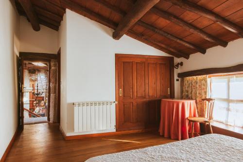 Postel nebo postele na pokoji v ubytování Casa Do Romualdo