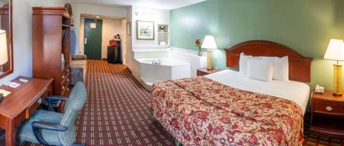 Letto o letti in una camera di Select Inn Murfreesboro