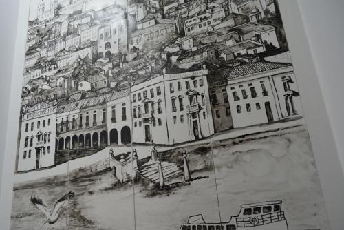 a drawing of a city with buildings at Castle Inn Lisbon Apartments in Lisbon