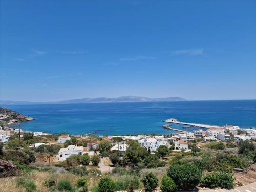 a view of a town and the ocean at Stella's Houses in Agia Pelagia Kythira
