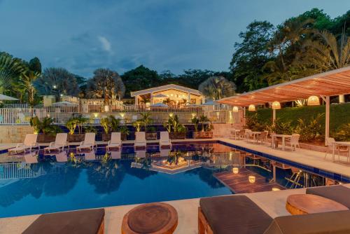 a view of the pool at a resort at Hotel Villa Camila in La Pintada