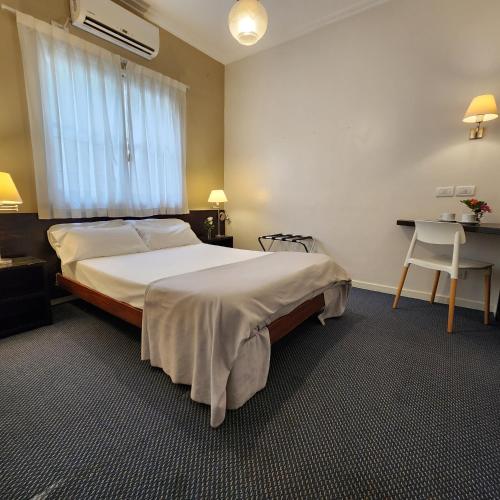 Postel nebo postele na pokoji v ubytování Hotel Arcos