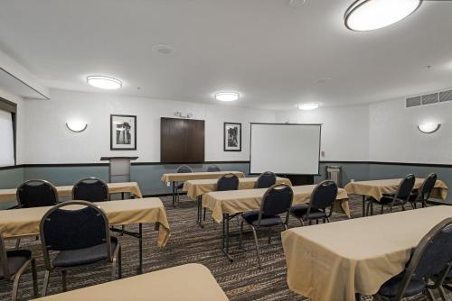 a classroom with tables and chairs and a whiteboard at Best Western Plus Wine Country Inn & Suites in Santa Rosa