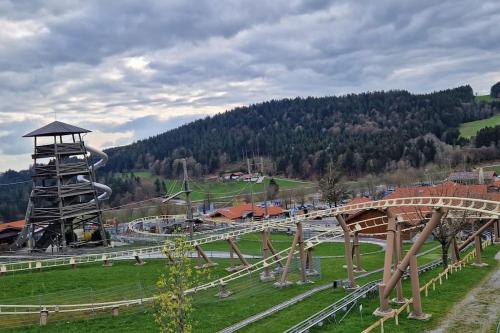 a large amusement park with a roller coaster at Sauna, Pools mit XXL-Terasse oder Kinderkino in Sankt Englmar