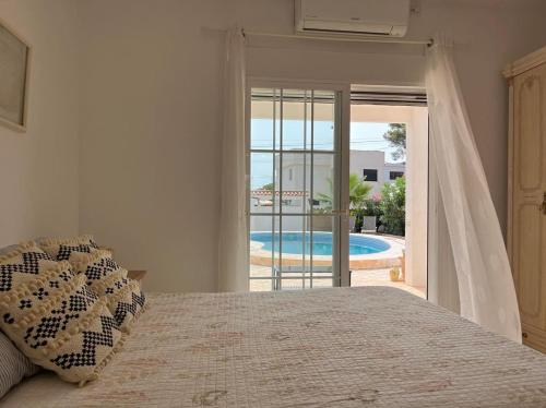 Postel nebo postele na pokoji v ubytování Villa Maria by Albir Proper Properties