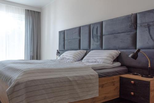 Postel nebo postele na pokoji v ubytování Apartament Water Wings by Major Domus Club