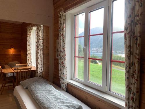 Postel nebo postele na pokoji v ubytování Fjordshelter dorm