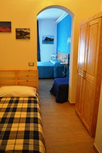 Posteľ alebo postele v izbe v ubytovaní B&B Vivere il Mare