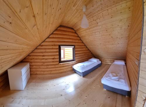 Postel nebo postele na pokoji v ubytování Park Resort Trzęsacz