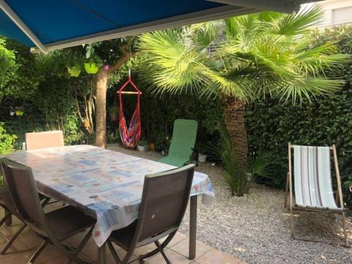 Photo de la galerie de l'établissement Villa avec Rez de jardin Classée 3*, à La Grande Motte