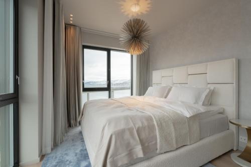 Katil atau katil-katil dalam bilik di Vindlys Luxury Penthouse Apartment