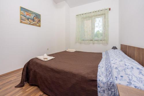 Postel nebo postele na pokoji v ubytování Apartment David