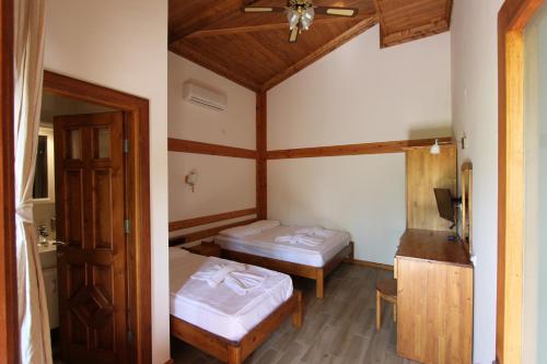 Postel nebo postele na pokoji v ubytování Elly's Home