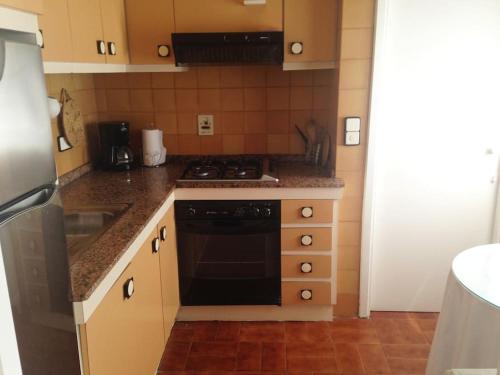 Η κουζίνα ή μικρή κουζίνα στο Apartamento Playa Rons