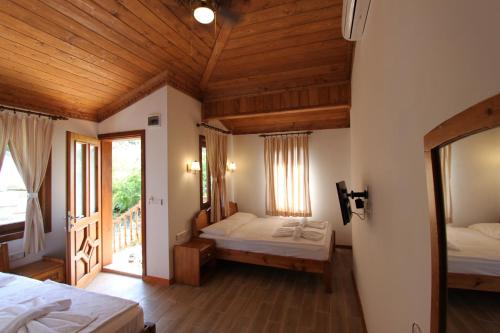 Postel nebo postele na pokoji v ubytování Elly's Home