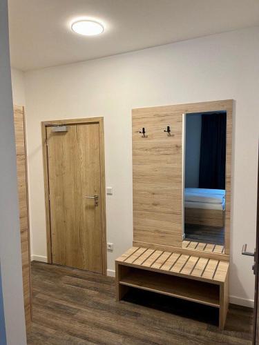 Postel nebo postele na pokoji v ubytování NB Apartments
