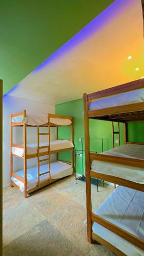 Postel nebo postele na pokoji v ubytování Sunsand Beach Suítes e Hostel
