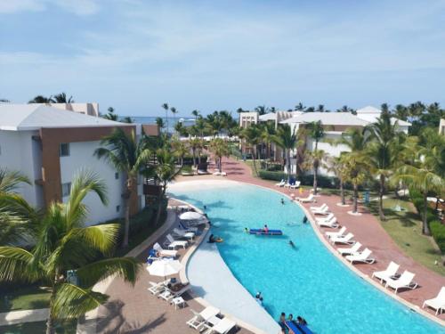an aerial view of a pool at a resort at Cortesito santana in Punta Cana