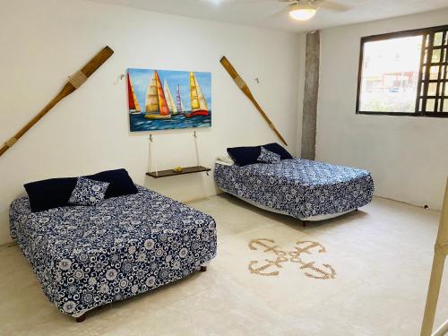 Postel nebo postele na pokoji v ubytování La Casa del Mangle