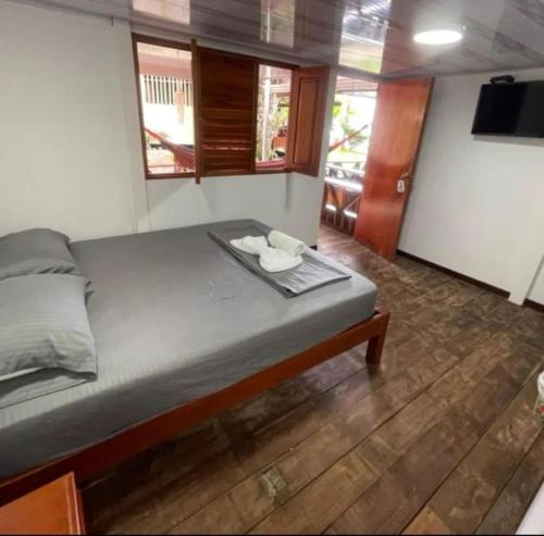 Postel nebo postele na pokoji v ubytování Cabañas las perlas