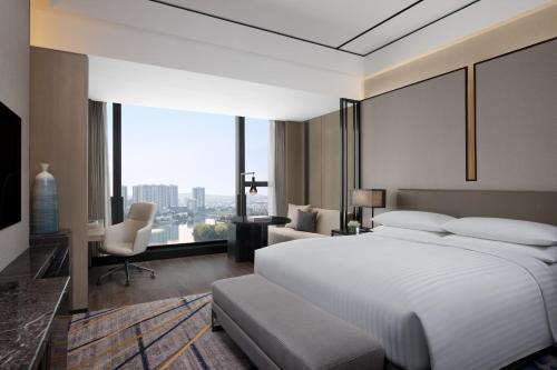 Marriott Nanjing South Hotelにあるベッド
