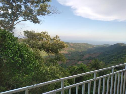 a balcony with a view of a valley at Casa Gonzalez 