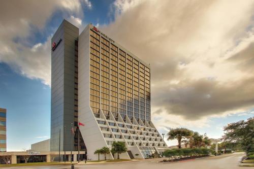 uma representação do trunfo hotel e casino internacional em Mobile Marriott em Mobile