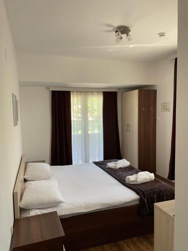 Ένα ή περισσότερα κρεβάτια σε δωμάτιο στο Motel & Restaurant Dar