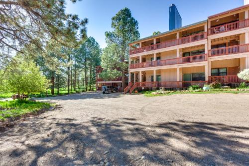 an empty parking lot in front of a building at Angel Fire Studio with Fireplace, Walk to Resort! in Angel Fire